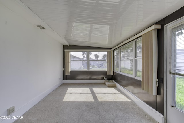 34 Kathy Dr, Ormond Beach, FL 32176 - unfurnished sunroom featuring carpet flooring and lofted ceiling