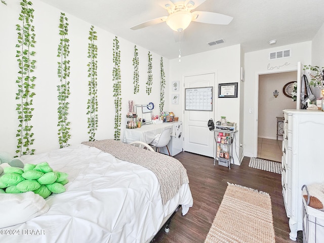 bedroom featuring ceiling fan and dark hardwood / wood-style flooring