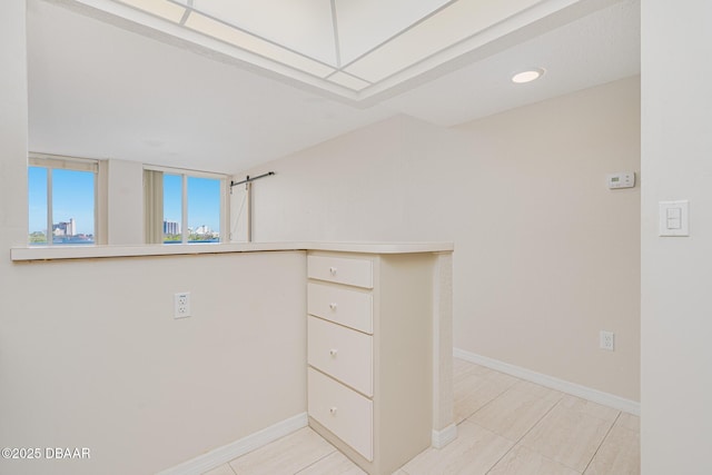 interior space with light tile patterned floors