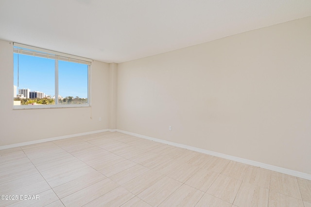 view of tiled spare room