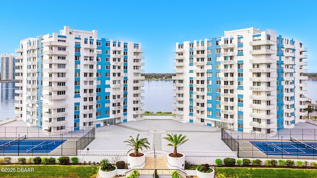 view of building exterior with a water view