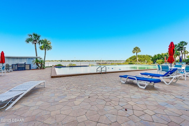 view of patio / terrace featuring a water view