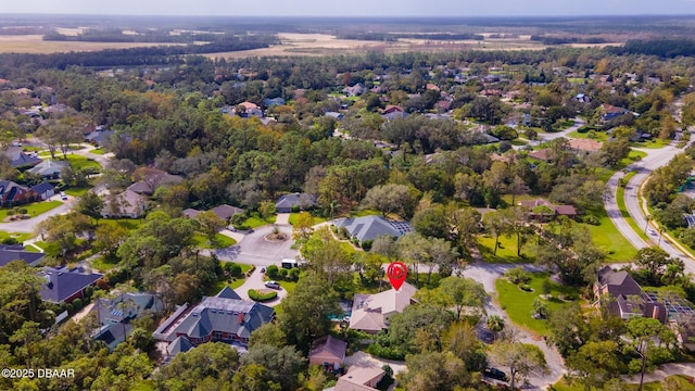 birds eye view of property with a residential view