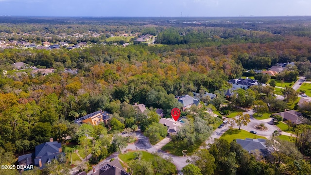 bird's eye view with a forest view