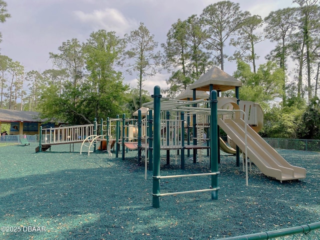 community jungle gym featuring fence