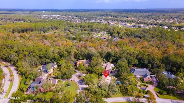 aerial view with a wooded view