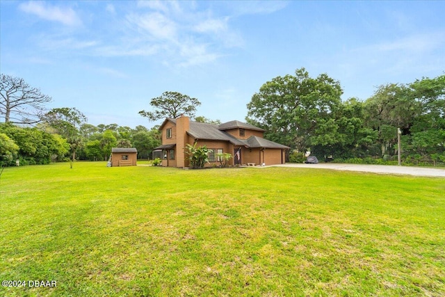 view of yard featuring a garage