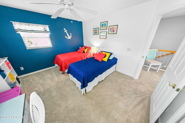 carpeted bedroom featuring ceiling fan