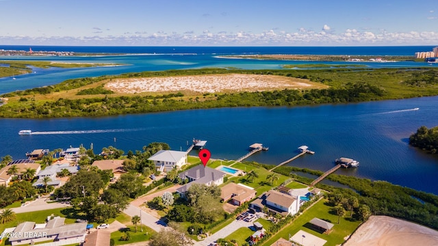 birds eye view of property featuring a water view