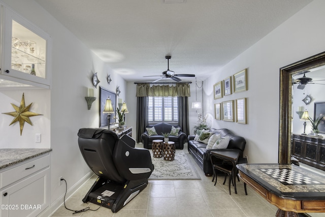 47 Abacus Ave, Ormond Beach, FL 32174 - living area featuring a ceiling fan and light tile patterned flooring