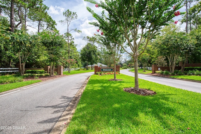 47 Abacus Ave, Ormond Beach, FL 32174 - view of asphalt street featuring curbs