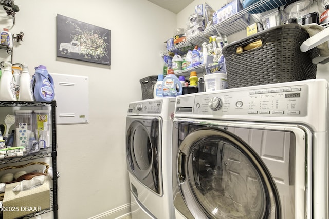 47 Abacus Ave, Ormond Beach, FL 32174 - laundry area with independent washer and dryer and baseboards