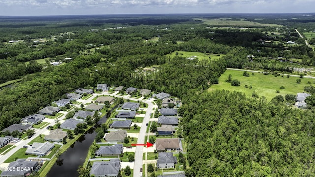 47 Abacus Ave, Ormond Beach, FL 32174 - view of property location with a heavily wooded area, a large body of water, and nearby suburban area