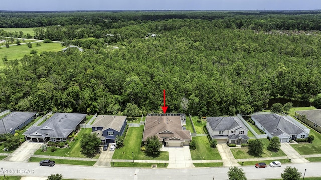 47 Abacus Ave, Ormond Beach, FL 32174 - aerial perspective of suburban area featuring a forest
