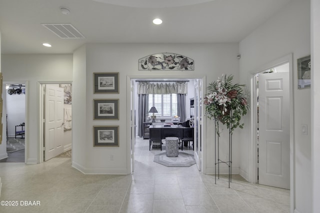 47 Abacus Ave, Ormond Beach, FL 32174 - hallway featuring recessed lighting, baseboards, a desk, and light tile patterned flooring
