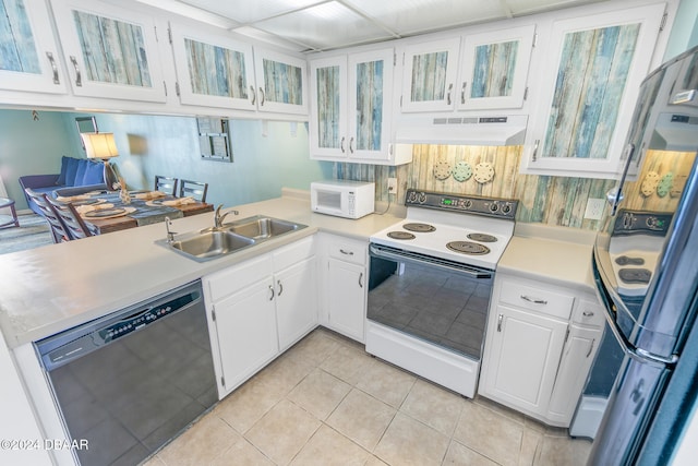 kitchen featuring white cabinetry, dishwasher, sink, range with electric stovetop, and light tile patterned flooring