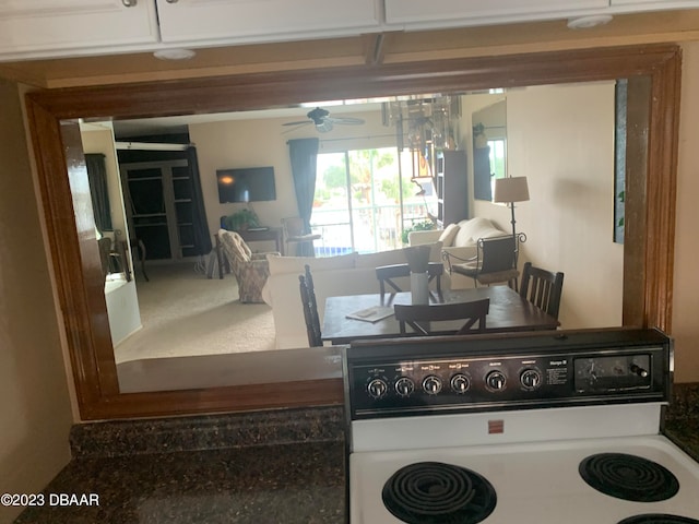 kitchen with ceiling fan and electric range