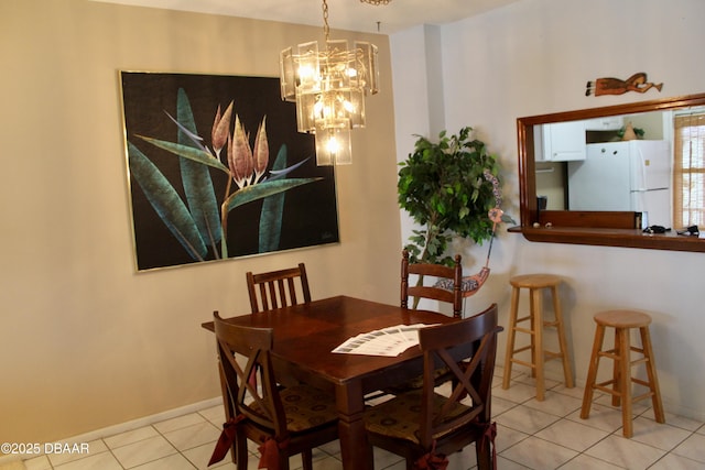 dining room featuring light tile patterned flooring