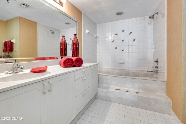 2425 S Atlantic Ave Unit 202, Daytona Beach, FL 32118 - bathroom featuring tile patterned floors, vanity, and tub / shower combination