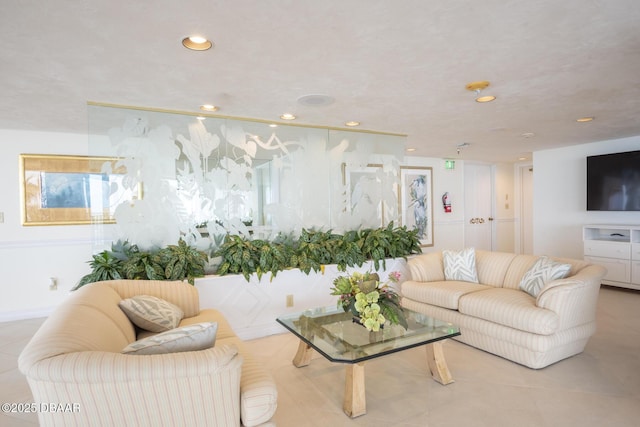 2425 S Atlantic Ave Unit 202, Daytona Beach, FL 32118 - tiled living room with recessed lighting