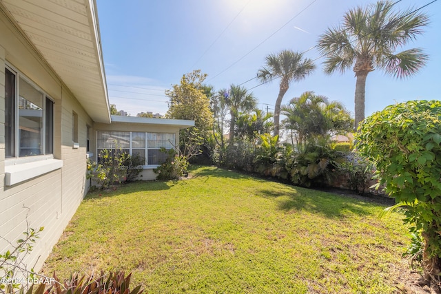 view of yard with a sunroom