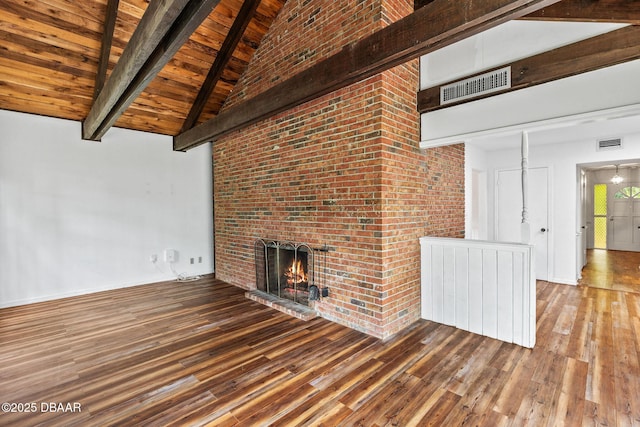 4 Eagle Rock Trl, Ormond Beach, FL 32174 - unfurnished living room featuring hardwood / wood-style floors, a fireplace, high vaulted ceiling, and wooden ceiling with exposed beams