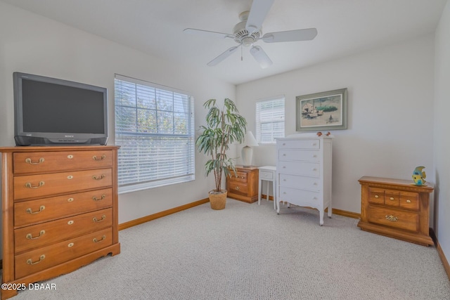 misc room featuring light carpet and ceiling fan