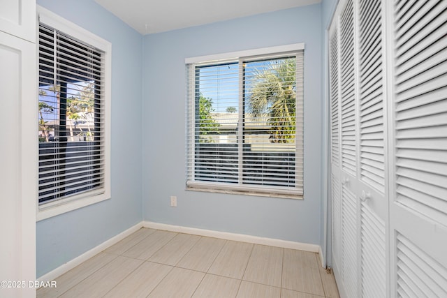 spare room with plenty of natural light