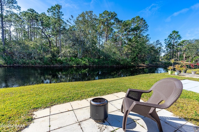 view of patio / terrace with a water view