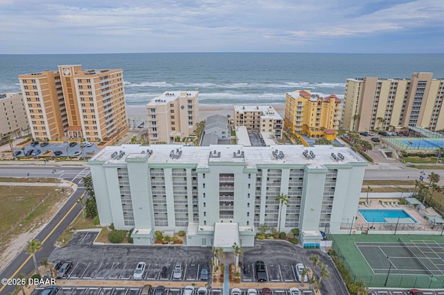 3800 S Atlantic Ave Unit 502, Daytona Beach, FL 32118 - drone / aerial view of a large body of water, apartment complex / building, and a pool area