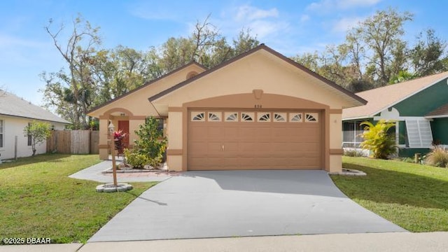 ranch-style house with a garage and a front lawn