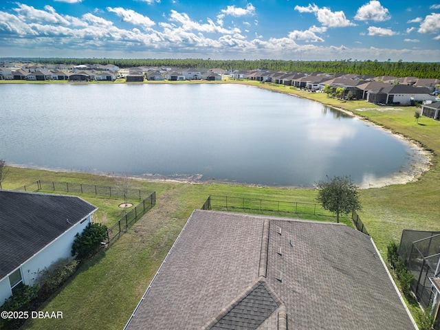 drone / aerial view with a water view