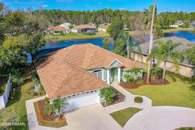 drone / aerial view featuring a water view