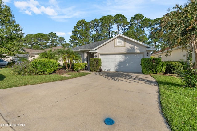 ranch-style home with a garage