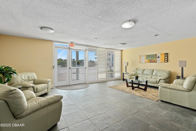 living room featuring a textured ceiling