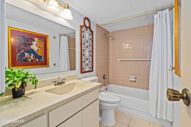 full bathroom featuring vanity, a textured ceiling, shower / bath combo with shower curtain, tile patterned flooring, and toilet