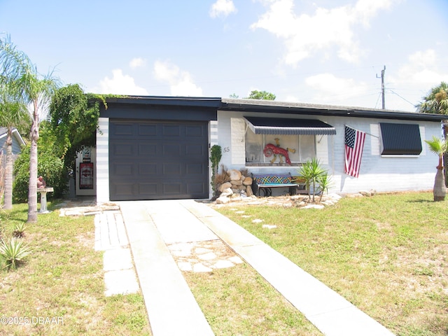 55 Seaside Dr, Ormond Beach, FL 32176 - view of front of property with a garage, concrete driveway, and a front yard