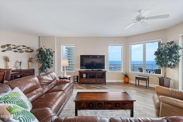 3737 S Atlantic Ave Unit 702, Daytona Beach, FL 32118 - living room with wood finished floors and ceiling fan