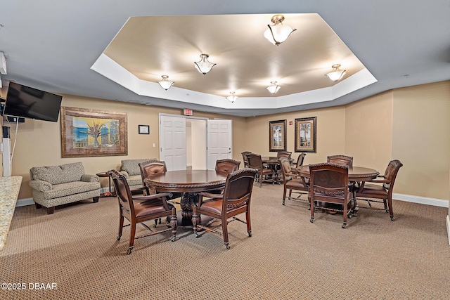 3737 S Atlantic Ave Unit 702, Daytona Beach, FL 32118 - dining room with a raised ceiling and light carpet