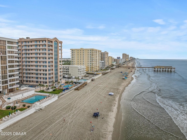3737 S Atlantic Ave Unit 702, Daytona Beach, FL 32118 - bird's eye view of unending shoreline and a pool area