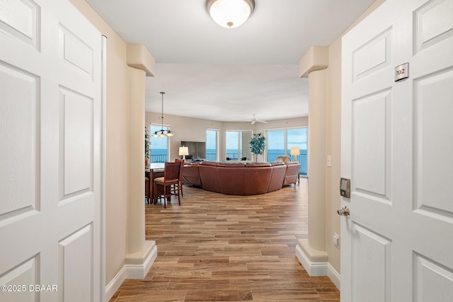 3737 S Atlantic Ave Unit 702, Daytona Beach, FL 32118 - hall with light wood-type flooring and baseboards