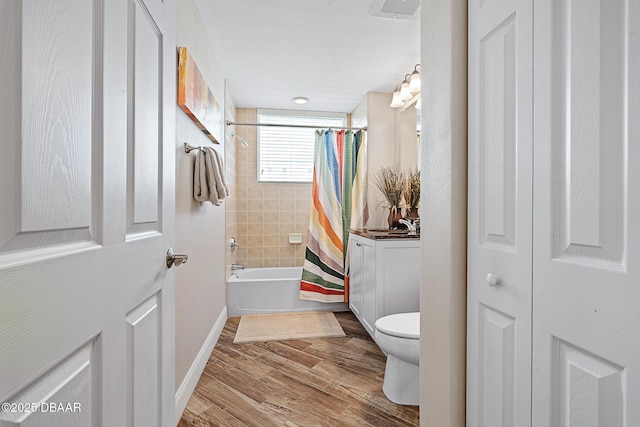 3737 S Atlantic Ave Unit 702, Daytona Beach, FL 32118 - bathroom featuring shower / bath combo, wood finished floors, a closet, and vanity