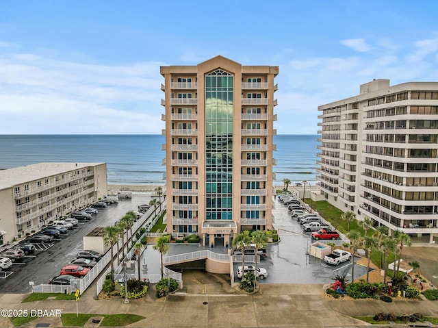 3737 S Atlantic Ave Unit 702, Daytona Beach, FL 32118 - view of building exterior featuring a water view