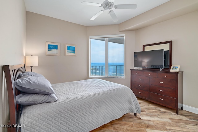 3737 S Atlantic Ave Unit 702, Daytona Beach, FL 32118 - bedroom featuring light wood finished floors and a ceiling fan