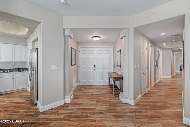 3737 S Atlantic Ave Unit 702, Daytona Beach, FL 32118 - hall with light wood finished floors