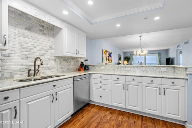 3333 S Atlantic Ave Unit 1802, Daytona Beach, FL 32118 - kitchen featuring stainless steel dishwasher, dark wood-style floors, recessed lighting, decorative backsplash, and a chandelier