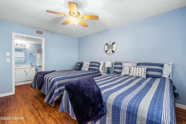 3333 S Atlantic Ave Unit 1802, Daytona Beach, FL 32118 - bedroom with wood finished floors, ensuite bathroom, and a ceiling fan