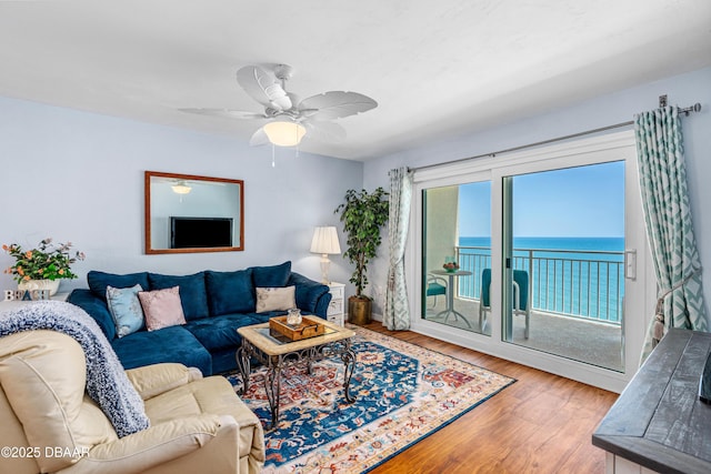3333 S Atlantic Ave Unit 1802, Daytona Beach, FL 32118 - living area with wood finished floors and a ceiling fan