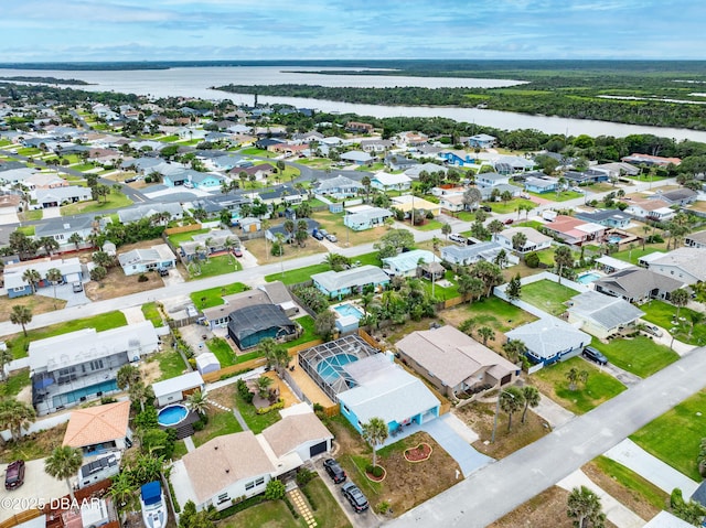 8 Tarpon Ave, Ormond Beach, FL 32176 - aerial overview of property's location with a nearby body of water and nearby suburban area