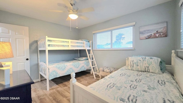 8 Tarpon Ave, Ormond Beach, FL 32176 - bedroom with wood finished floors, ceiling fan, and baseboards